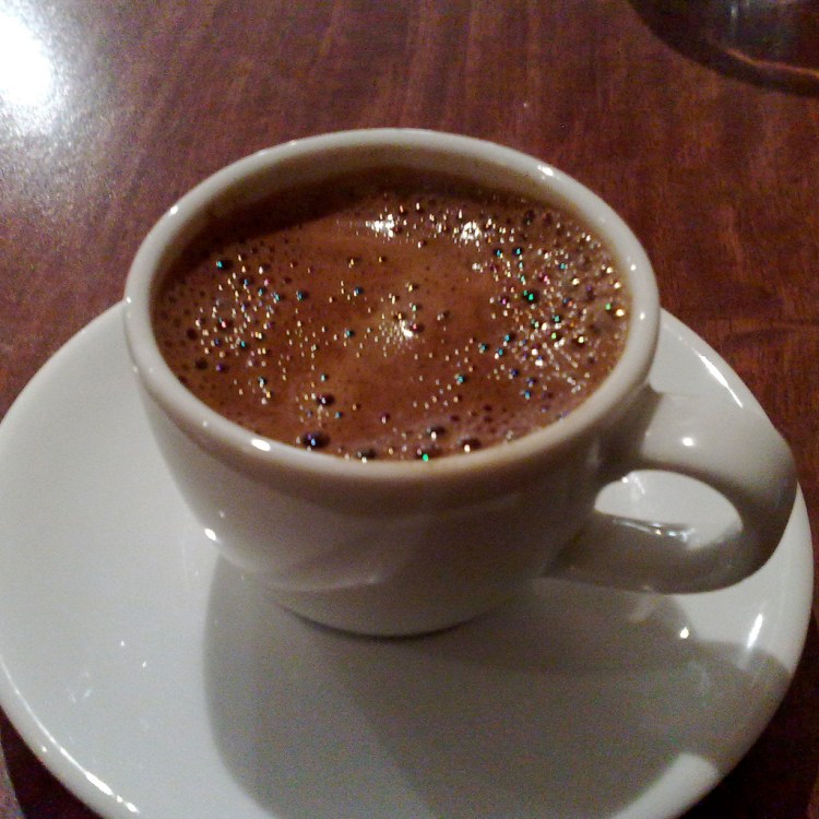 The author has positive attitudes towards drinking coffee incessantly. But other factors (i.e. budgetary concerns and the biological need for sleep) limit him to 1-2 cups a day. Turkish Coffee by Secretlondon123. CC BY-SA 2.0