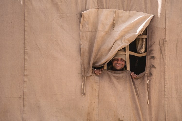 The smiling face of a man in northern India.