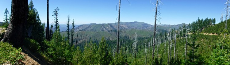 A panorama of green mountains.