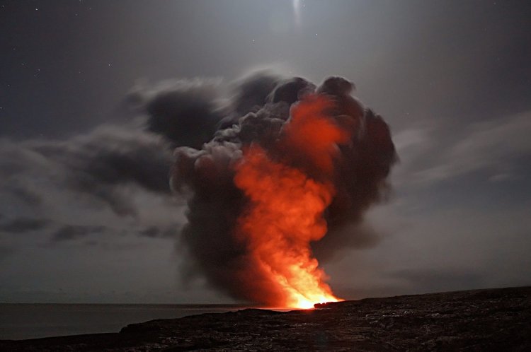 A volcano erupting.