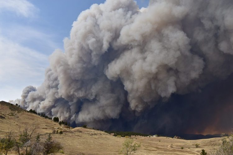 A giant smoke plume from a wildfire.